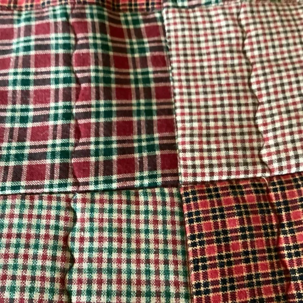 NWT. Hand, crafted baby bib in brown and green shirt  plaids